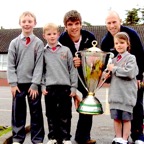 Rugby stars Donncha O’Callaghan and Peter Stringer brought the Heineken Cup to Cloghroe School in April 2006.jpg