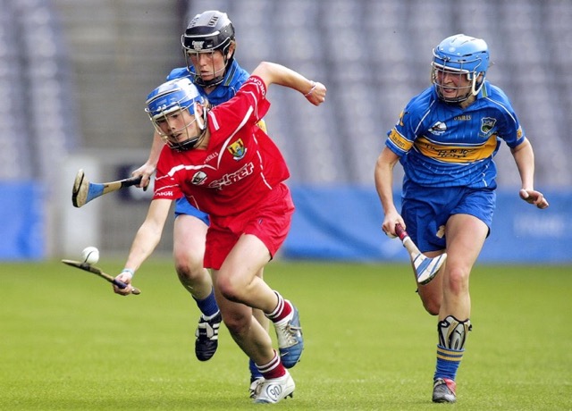 Rena Buckley displays great skill with hurley and ball as she leaves two Tipperary forwards trailing in the 2005 All-Ireland camogie final at Croke Park