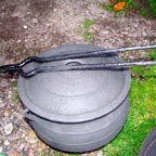 Cast Iron Pan with Lid and Tongs.jpg
